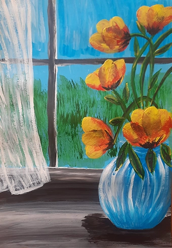 Orange flowers by the window
